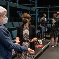 Leah Lowe and Denice Hicks chat inside Neely Auditorium