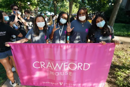 Students from each of The Ingram Commons houses march onto Alumni Lawn for the Founders Walk celebration.