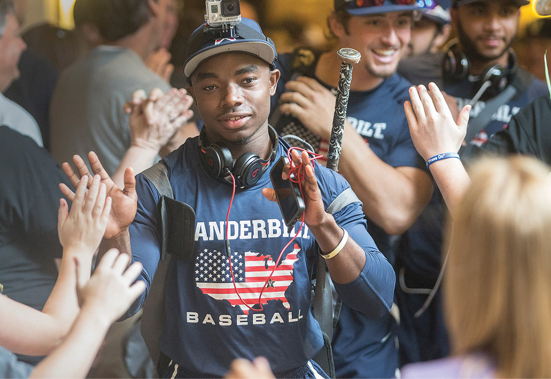 Ro Coleman greets fans June 22, 2015, before a rematch with Virginia at the College World Series.