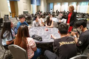 Provost C. Cybele Raver meets parents and students before International Student Orientation in August 2022. (Harrison McClary/Vanderbilt University)