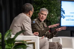 Summit moderator David Owens asks questions of Gen. Paul M. Nakasone, U.S. Army following his keynote address during the Summit on Modern Conflict and Emerging Threats.