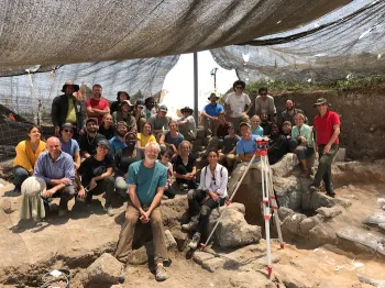 Joe Rife (center, in green) and Phil Liberman (far right, in red) with the Vanderbilt Caesarea excavation team