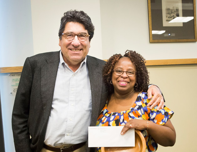 Chancellor Nicholas S. Zeppos presented Campus Dining's Maxine Ebanks with the Heart and Soul Staff Appreciation Award Nov. 15. (Susan Urmy/Vanderbilt)