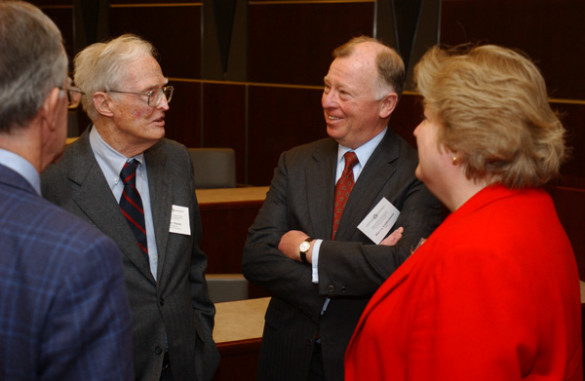 Daane (second from left) speaks with the late Harvey Goldschmid (second from right), then a member of the U.S. Securities and Exchange Commission, at the Owen School's Financial Markets Research Center Conference in 2003. (Daniel Dubois/Vanderbilt)