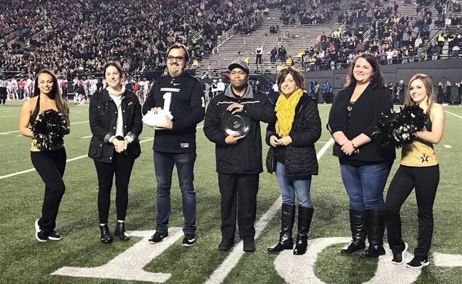 The Facilities department Controls Group celebrated its title of “greenest group on campus” at the Vanderbilt vs. Ole Miss game on Nov. 17. (Vanderbilt University)
