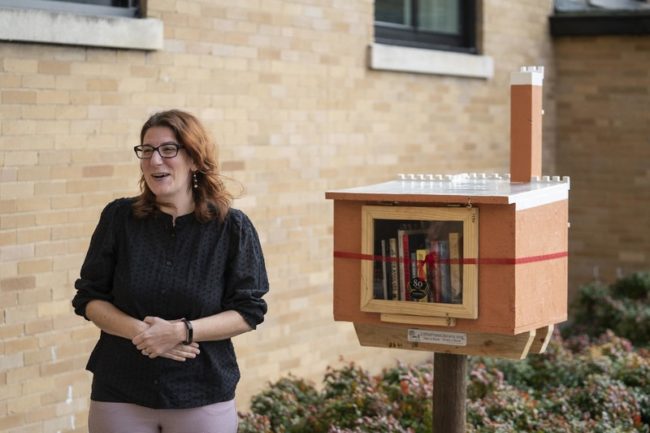 VU Press Director Gianna Mosser speaks at ribbon-cutting for new Little Free Library