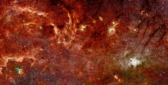 Hubble-Spitzer mosaic of galactic center lots of stars on a black background