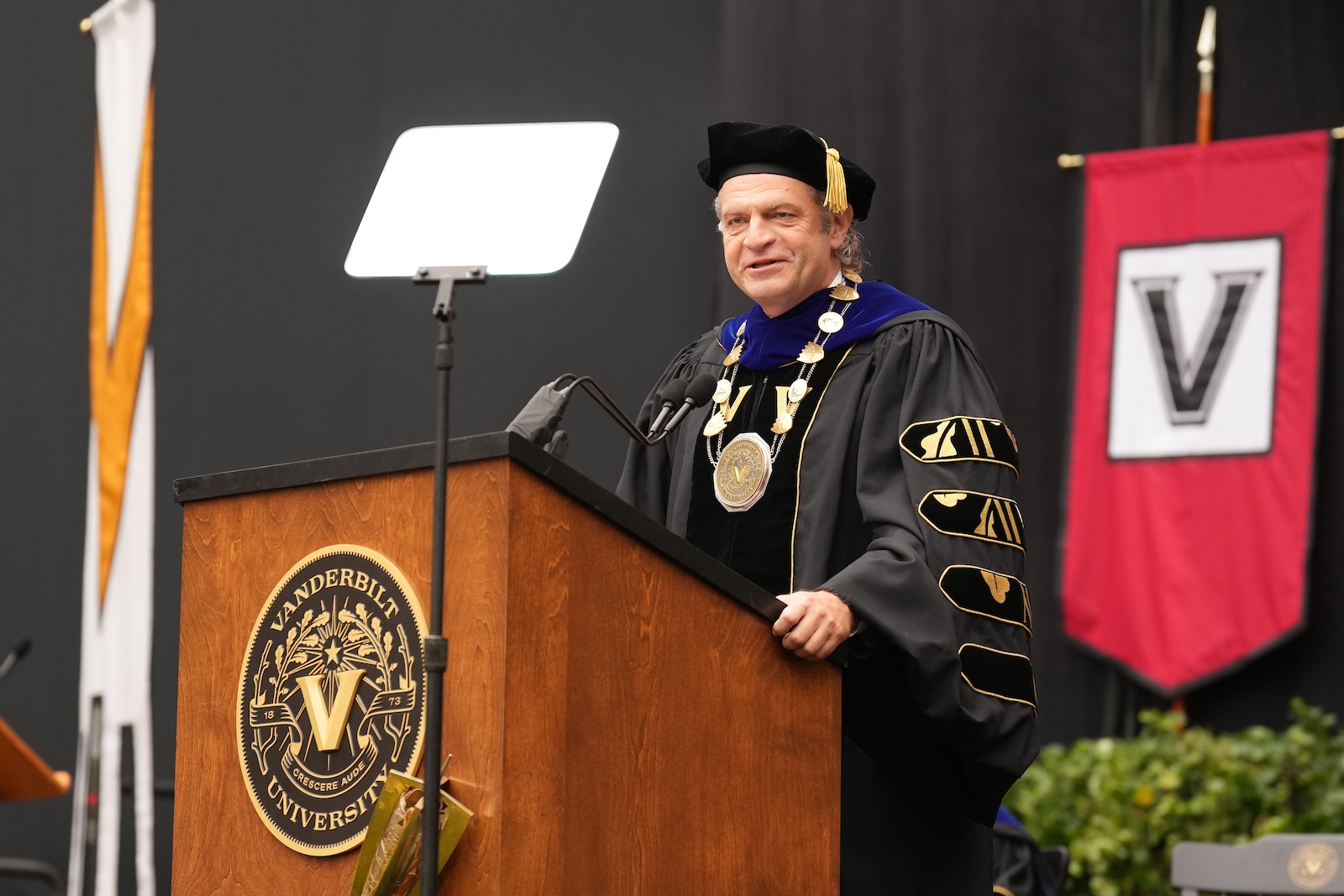 Chancellor Diermeier addressing audience at 2025 Commencement.