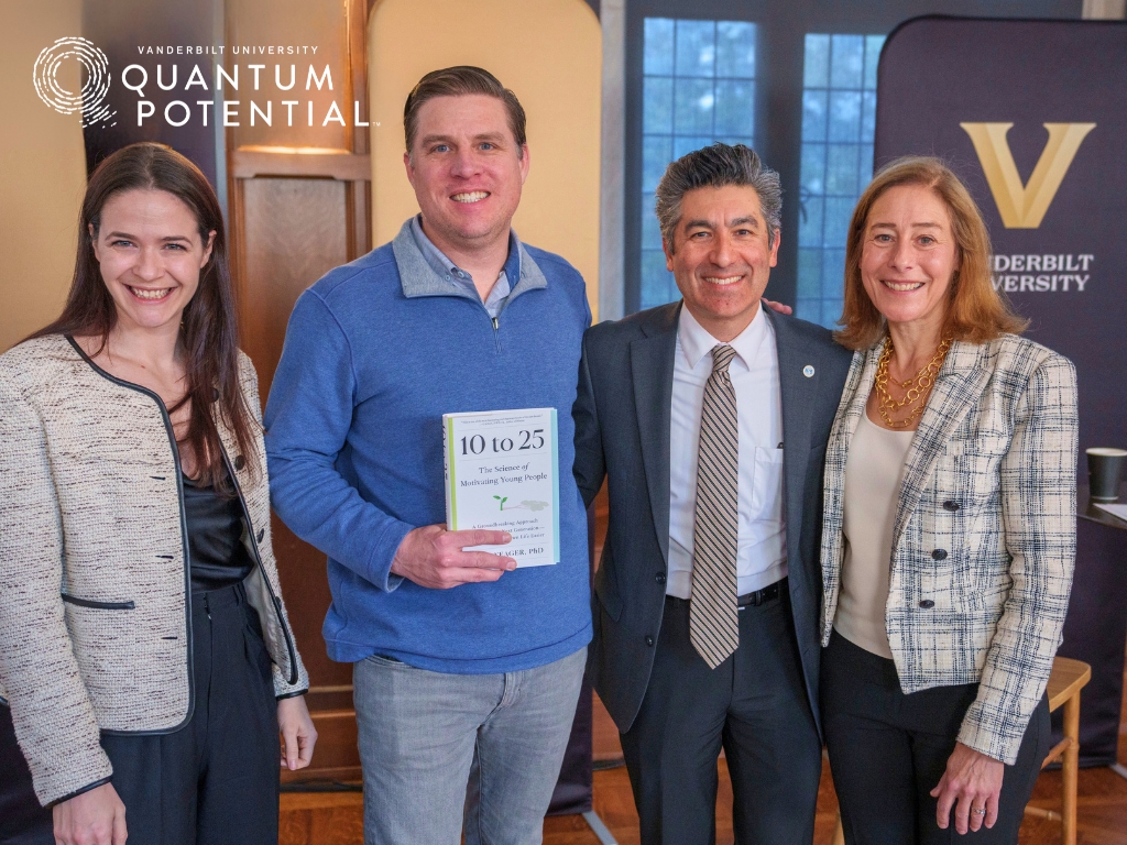 Image Description: Posed photo of David Yeager alongside Provost Cybele Raver.