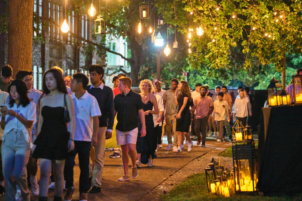 Students make their way to Alumni Lawn during Founders Walk.