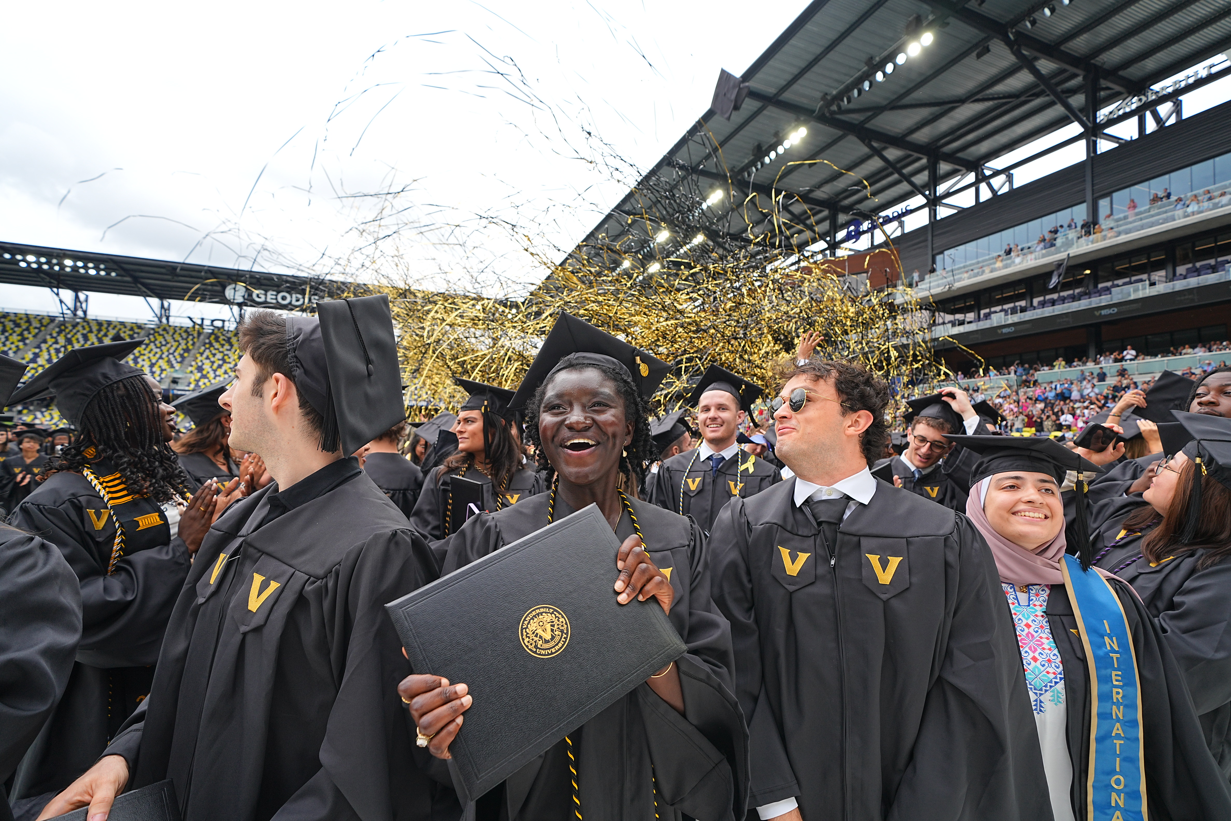 Class of 2024 students celebrate receiving their diplomas at GEODIS Park. 