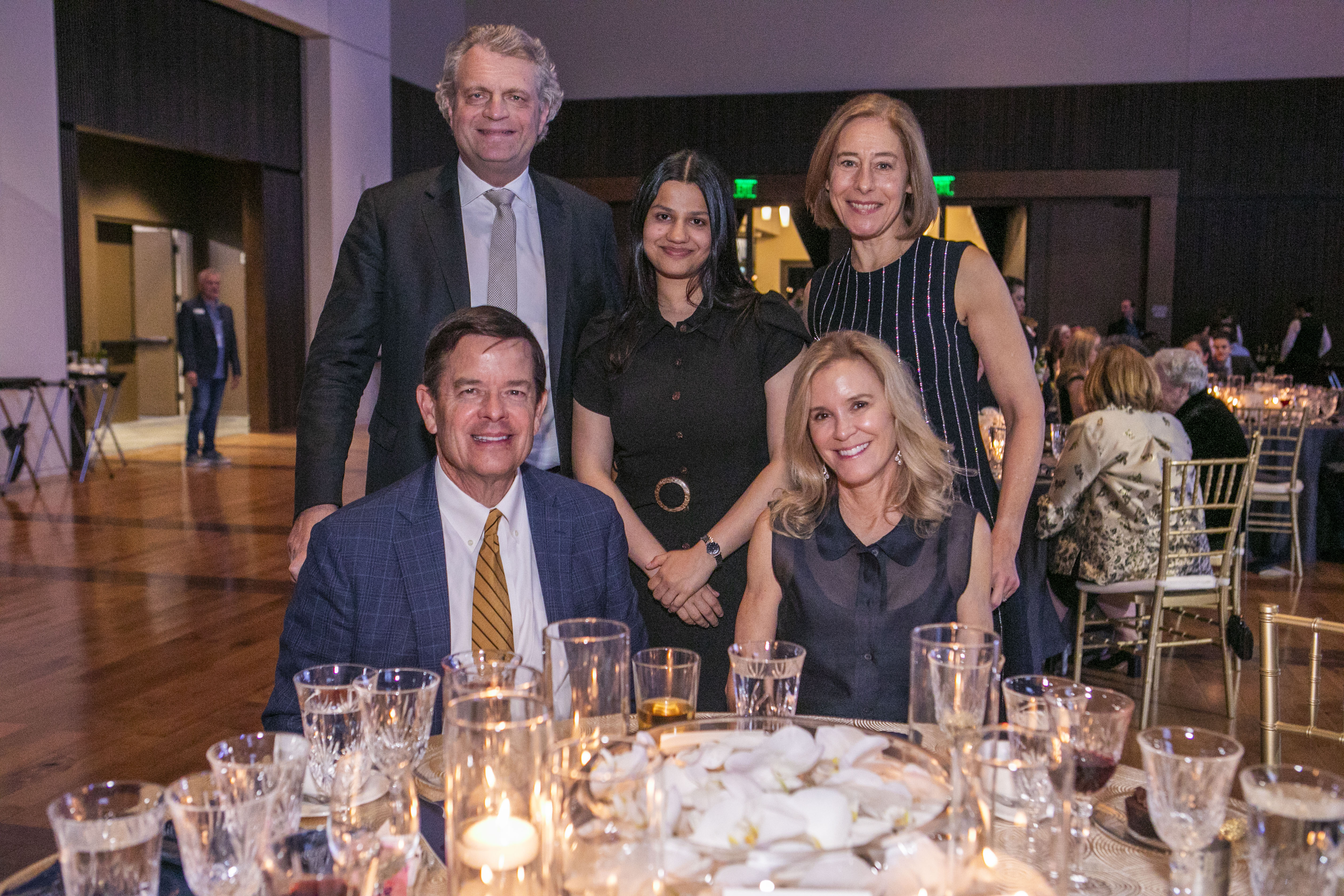Chancellor Daniel Diermeier and C. Cybele Raver, provost and vice chancellor for academic affairs celebrate with members of the Ingram family at the Ingram Scholars 30th Reunion.