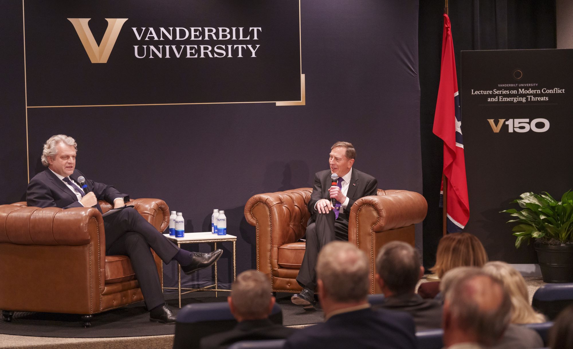 Chancellor Daniel Diermeier.sits with General David Petraeus on a stage during the Lecture Series on Modern Conflict and Emerging Threats 