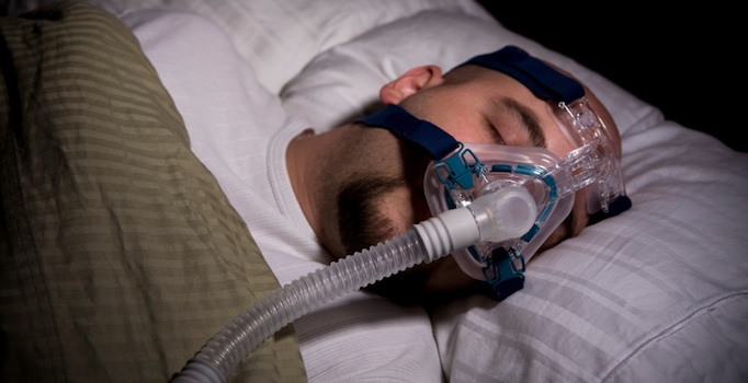 man wearing cpap