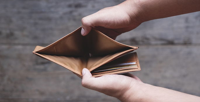 Hand opening empty wallet