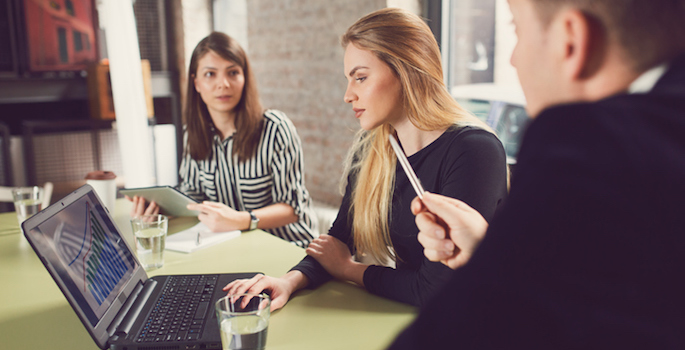 Angry manager scolding one of his subordinate at the office.
