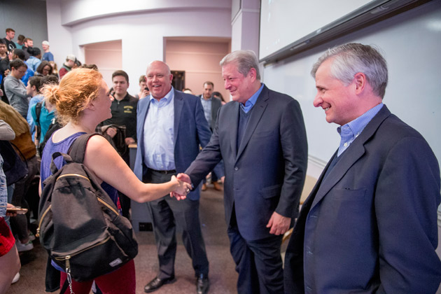 Vice President Al Gore greets first-year student Abby Brafman, a Marjory Stoneman Douglas High School Class of 2017 alumna and the organizer of the Nashville March for Our Lives, March 26 following the Leadership class taught by professors John Geer (left) and Jon Meacham (right). (John Russell/Vanderbilt)