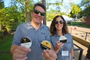 Families receive welcome stickers at Move-In 2023. (Nick Hessler/Vanderbilt University)
