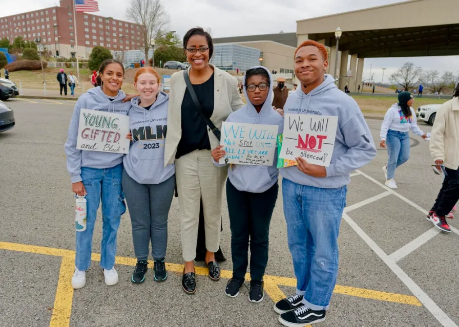 Vanderbilt Vice Chancellor for Athletics and University Affairs and Athletic Director Candice Lee, center, joins students participating in the 2023 MLK Day march in Nashville. (Vanderbilt University)