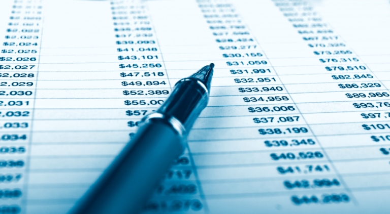 balance sheet with pen
