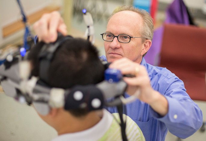 McNamara adjusting VR headset