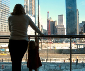 Mother and child looking at Ground Zero