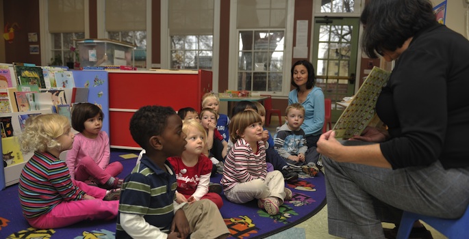 teacher reading to children