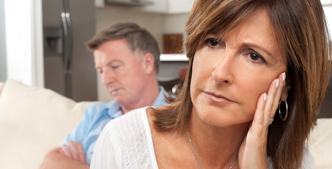 unhappy white middle aged couple