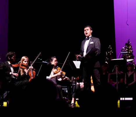 Crocker singing solo with the Willow Oak Chorale and Orchestra in Springfield, Tennessee. He grew up in this art school and, in 2020, became the conductor of the chorale and orchestra after two years as its assistant conductor.