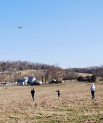 Reisner and his team running to reach the rocket at touchdown.