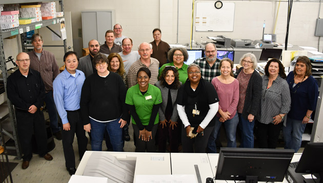 The Printing Services team gathers with EDI staff to celebrate their hard work. (Vanderbilt University)