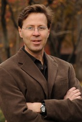 Rene Marois standing outdoors