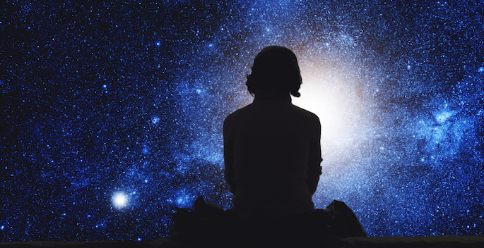 silhouette of girl looking at the stars