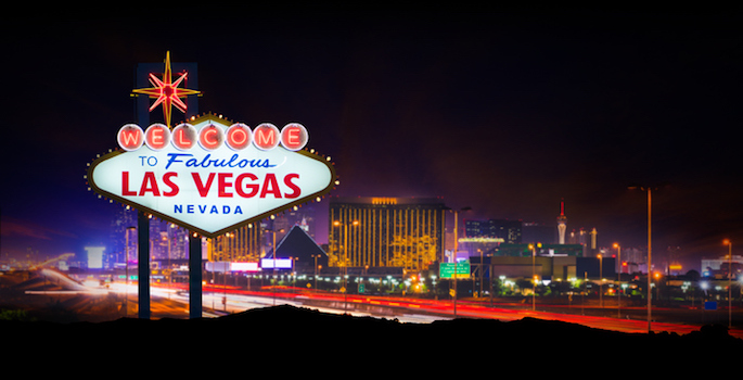 A stock photo of the Welcome to Fabulous Las Vegas Nevada sign with the world famous Las Vegas strip in the background.