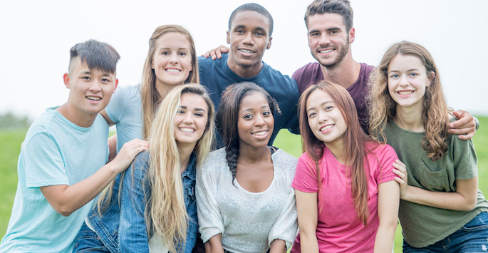 diverse group of high schoolers outside