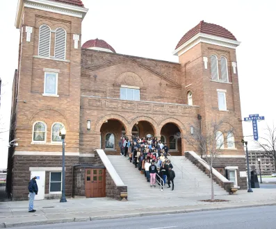Students on the Black History Immersion Excursion standing on the steps of the 16th Street Baptist Church in Birmingham, AL. This was the site of the September 15, 1963 church bombing that killed four young children. (Rosevelt Noble/Vanderbilt)