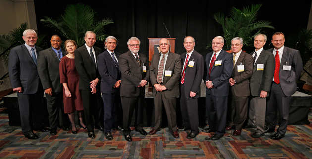 L-r: Provost and Vice Chancellor for Academic Affairs Richard McCarty, Kevin B. Johnson, Celia S. Applegate, David G. Blackbourn, Sergio Fazio, Tony K. Stewart, Haydar A. Frangoul, William O. Cooper, R. Jay Turner, Steven A. Webber, MacRae F. Linton and Vice Chancellor for Health Affairs and Dean of the School of Medicine Jeff Balser. (Vanderbilt University)