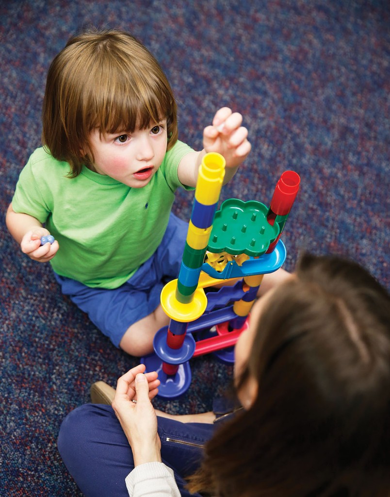 Baker_Bentley Speech–language pathologist Carolyn Estopinal works with 2-year-old Bentley Baker