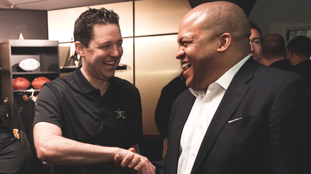 Men's Basketball Coach Bryce Drew (left) welcomes Vice Chancellor for Athletics and University Affairs and Athletics Director Malcolm Turner on Feb. 1. (Vanderbilt University)