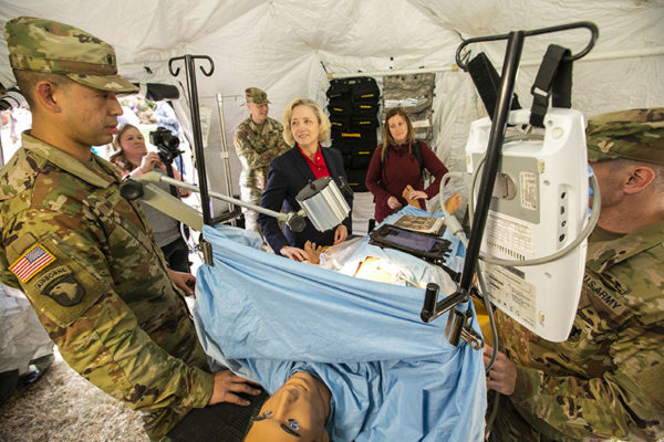 photo of Susan Wente and Mandi Mizner in a U.S. Army medevac tent