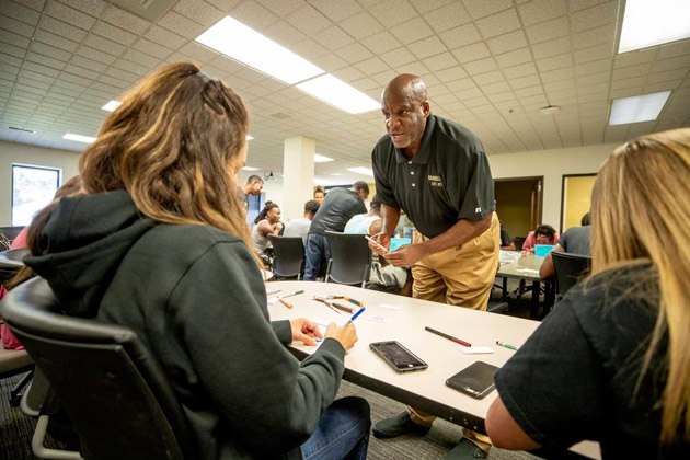 Nashville artist James Threalkill, BS'79, guided student-athletes during a workshop at McGugin Center July 13 on painting and visual arts. (John Russell/Vanderbilt)
