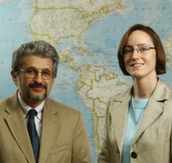 Political Science professor Mitch Seligson and Liz Zechmeister for Vanderbilt Arts and Science magazine.(Vanderbilt University / John Russell) Seligson and Zechmeister standing in front of map