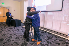 The Vice Chancellor for Administration established an annual divisional awards program to celebrate staff members for excellence in service, dedication to community values, and exceptional performance. (Pictured: Shaneithia Lewis, Corporal Jack and August Washington)