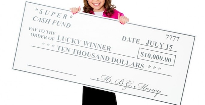 woman holding giant novelty prize check