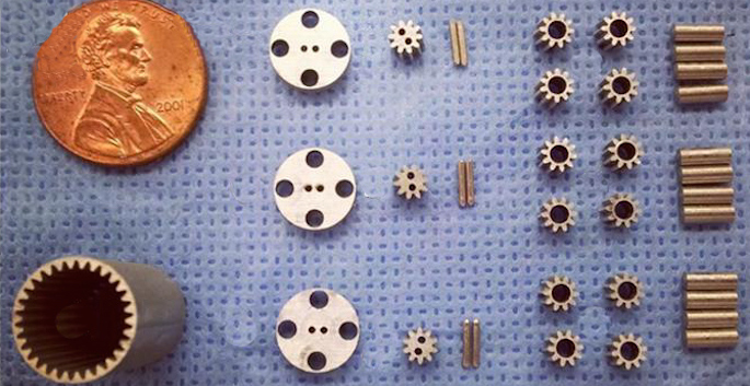 tiny parts compared to a penny for scale