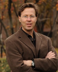 Rene Marois standing outdoors