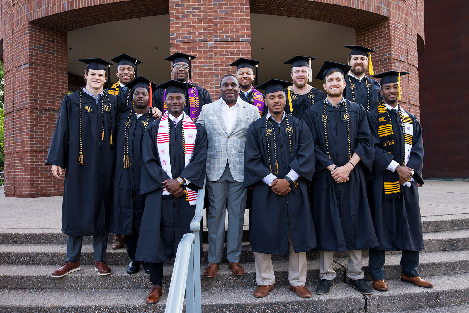From back, left to right: Caleb Scott, Khari Blasingame, Baffour Osei, Trey Ellis, Jay Woods, Head Coach Derek Mason, Dallas Rivers, Taurean Ferguson, Scott Sypniewski, Shawn Stankavage, Bailey Granier, Bryce Lewis