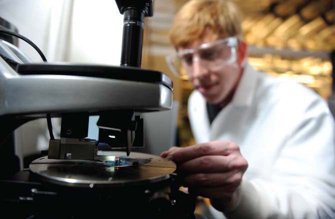 Student in lab using profilometer