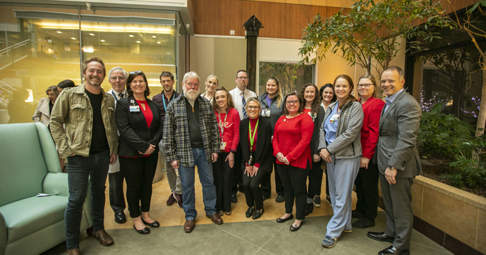 Attendees gather at last week’s dedication of “The Gift of Life” sculpture, which memorializes organ donors and their families and is on display in the Critical Care Tower.