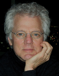 Man resting head on hand